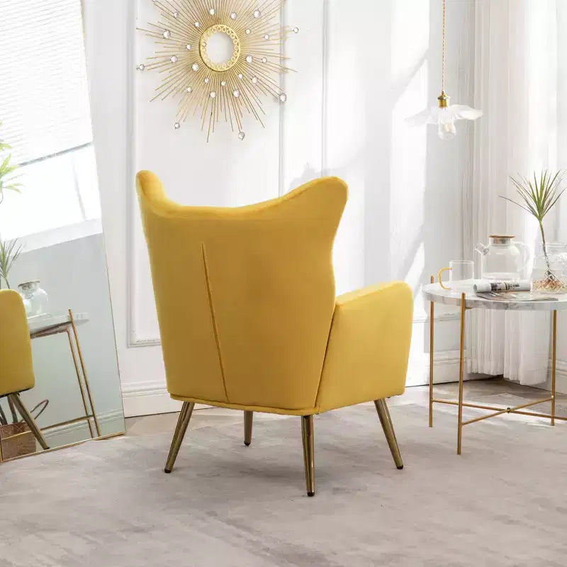 Fauteuil d'appoint en velours jaune, capitonné avec oreilles